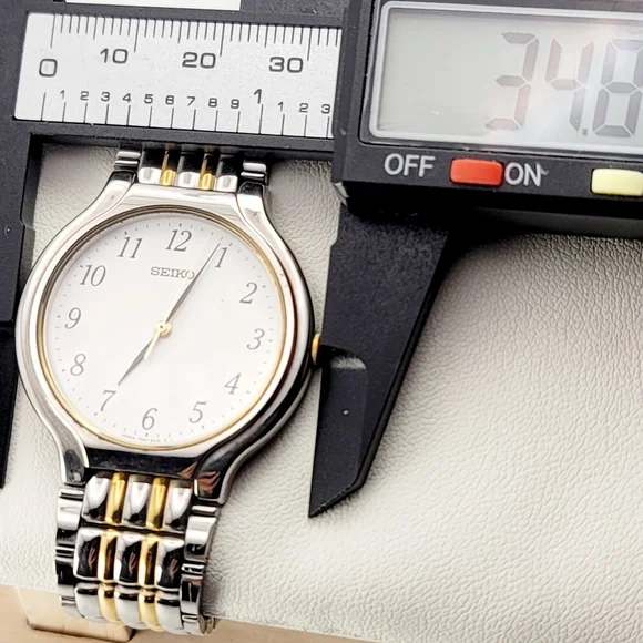 Vintage Seiko Quartz Two-Tone Dress Watch 7N01-6G90 Japan 34mm White Dial Unisex - Picture 9 of 9